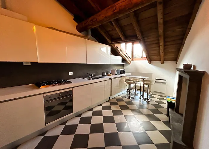 Апартаменты Loft Mansardato Sullo Skyline Di