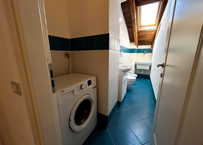 Апартаменты Loft Mansardato Sullo Skyline Di